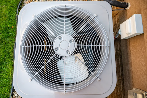 A bird's-eye view of a central air conditioner fan.